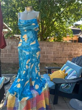 Elegant Blue Floral Maxi Dress draping chest line or cowl neck 
Saints & Secrets